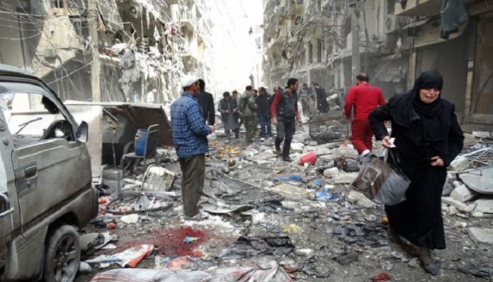 TOPSHOTS
A Syrian woman cries as she leaves a residential block repo