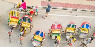 Moving Museums: Why UNESCO Declared Dhaka’s Rickshaw Art a World Heritage Colorful hand-painted back panel of a cycle rickshaw on the streets of Dhaka.
